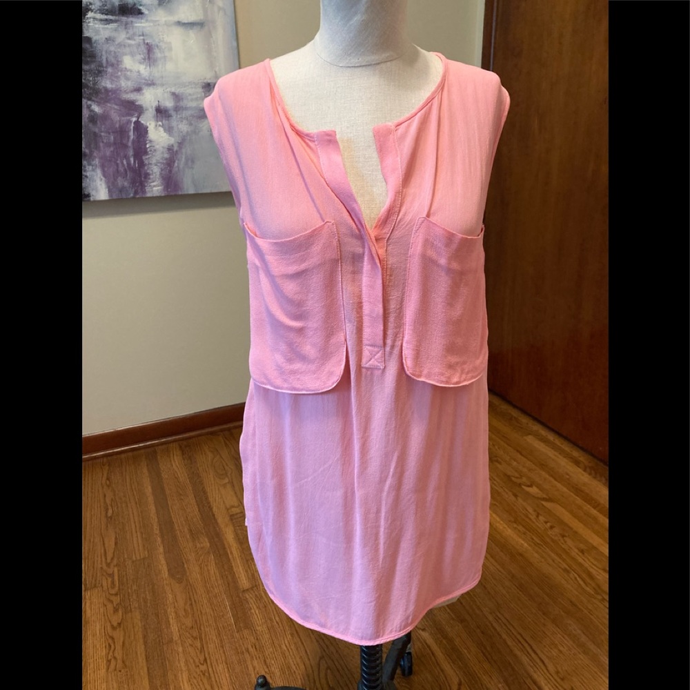 Language pink blouse